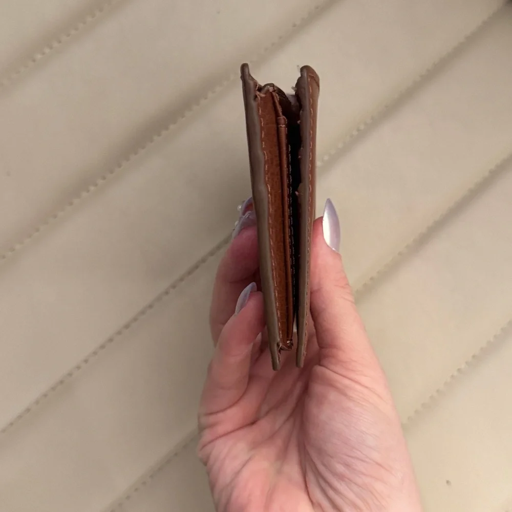 Fossil Tan Geometric Embossed Leather Bifold Wallet